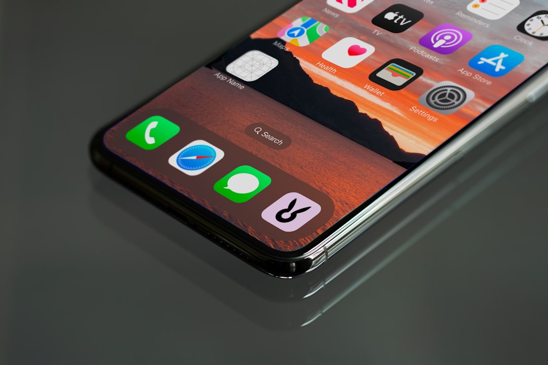 a cell phone with a picture of two people on it