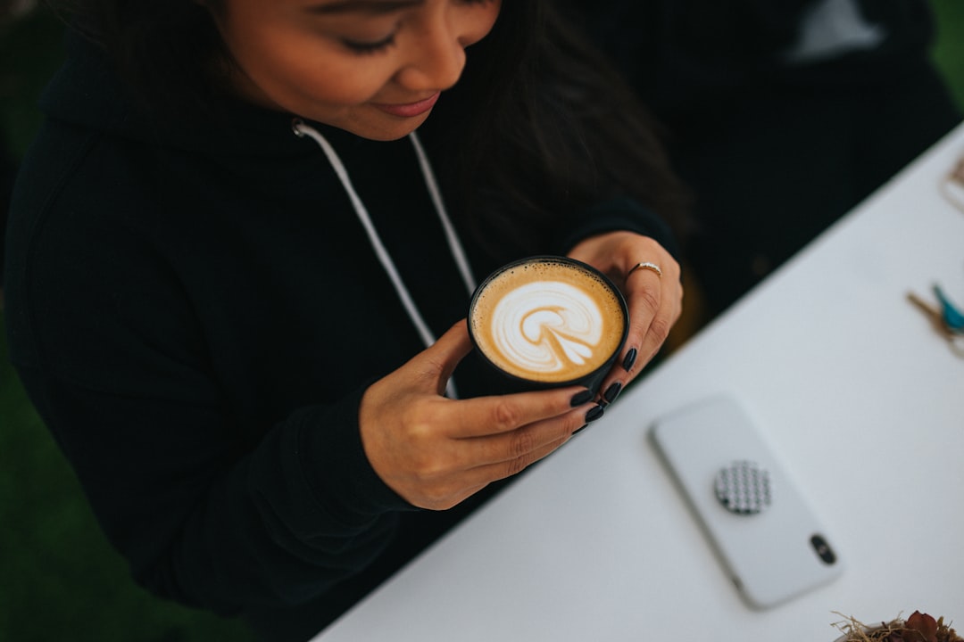 white ceramic mug with coffee