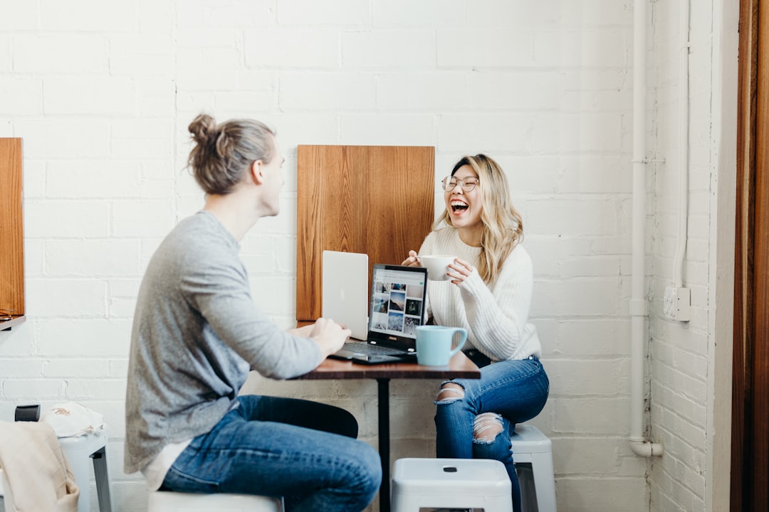 two mugs with coffee on table
